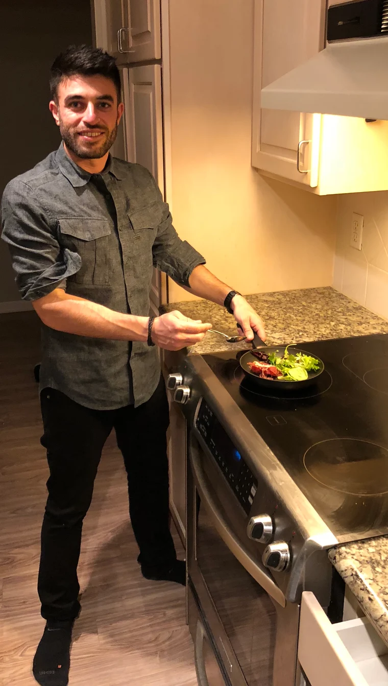 Robert Blake, Ink Hero’s founder and current owner, cooking in his kitchen